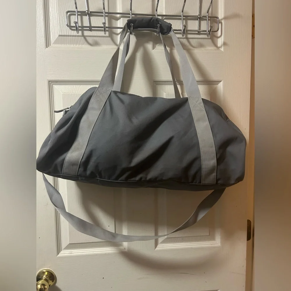 Nike Gray Duffel Bag with Pink/orange Gradient Logo